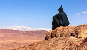 Alpinist standingToubkal in Atlas mountains Morocco