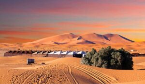 Camp site over sand dunes in Merzouga, Sahara desert, Morocco
