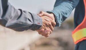 Shaking hands as a gesture of welcome and greeting 
