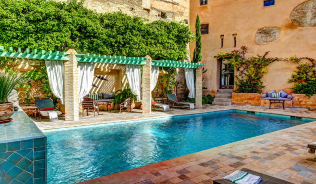 The swimming pool of the Riad LaRoussa Hotel in the old town of Fez, Morocco
