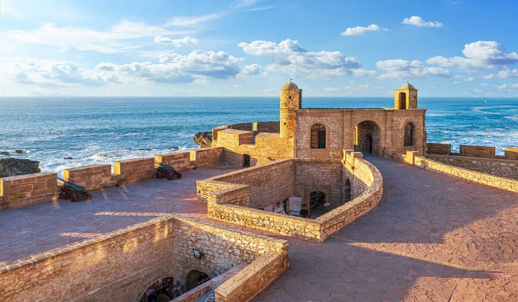 Sunlit Essaouira ramparts above the Atlantic Ocean